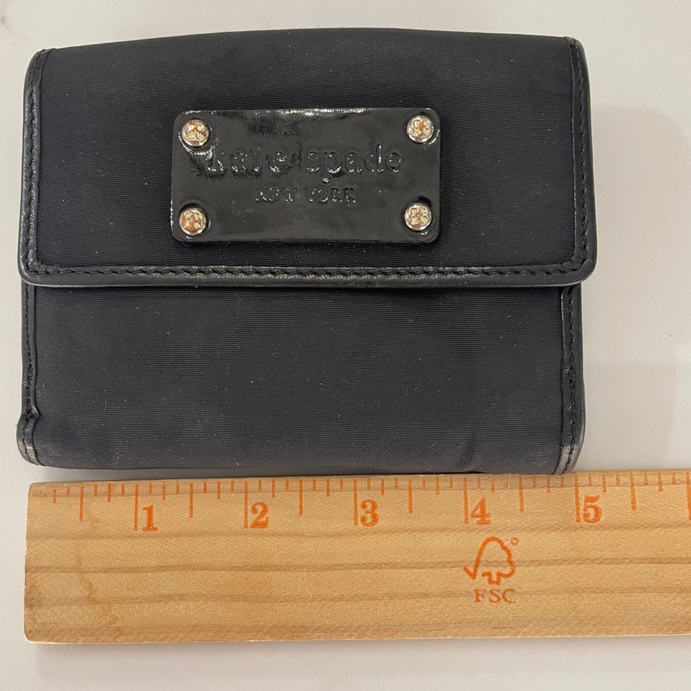 kate spade black bi-fold wallet with logo plate